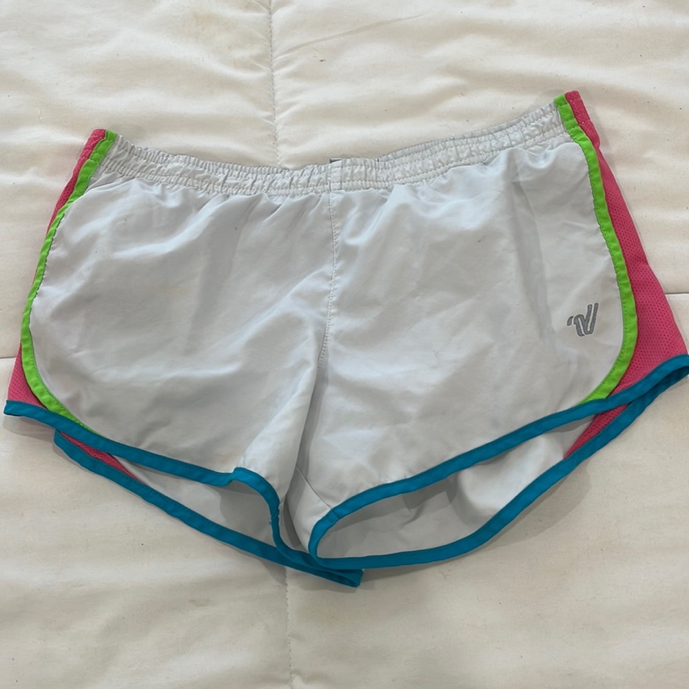 Varsity, White with pink, green, and blue on sides.
